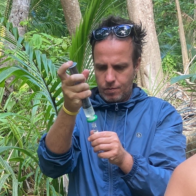 sampling groundwater on the atoll